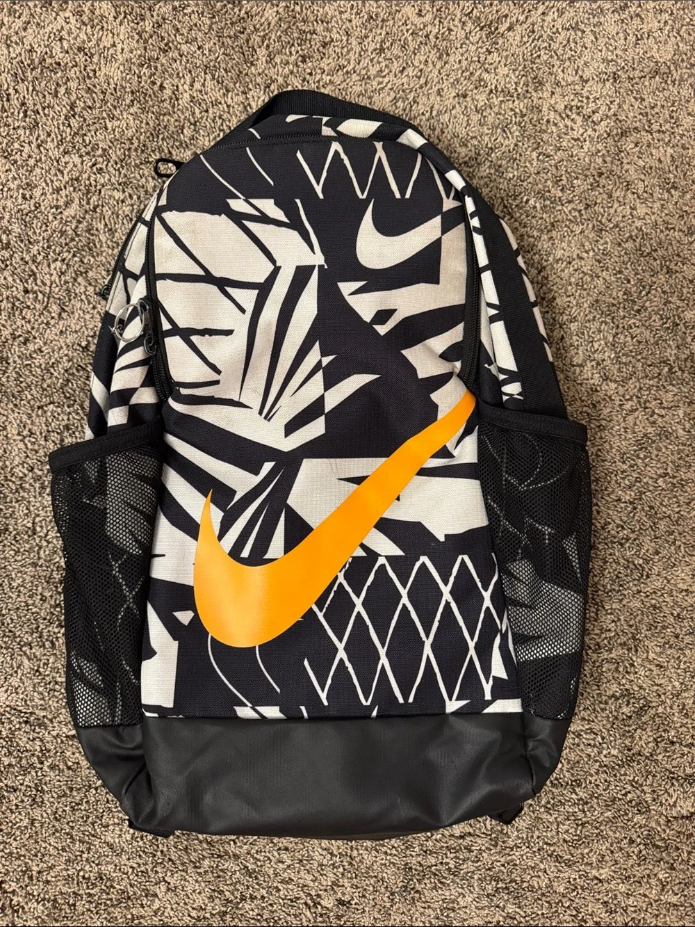 Nike Black & White Backpack with Orange Swoosh